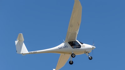 A Pipistrel Sinus VH-YAD ultralight aircraft taking off from Lethbridge airfield, Lethbridge, Australia, Nov. 2014.