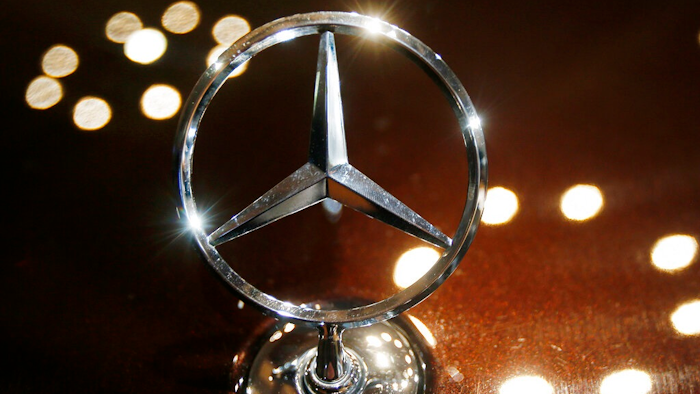 In this Feb. 5, 2015 file photo the logo of a Mercedes car is photographed during an annual press conference of Daimler AG in Stuttgart, Germany.