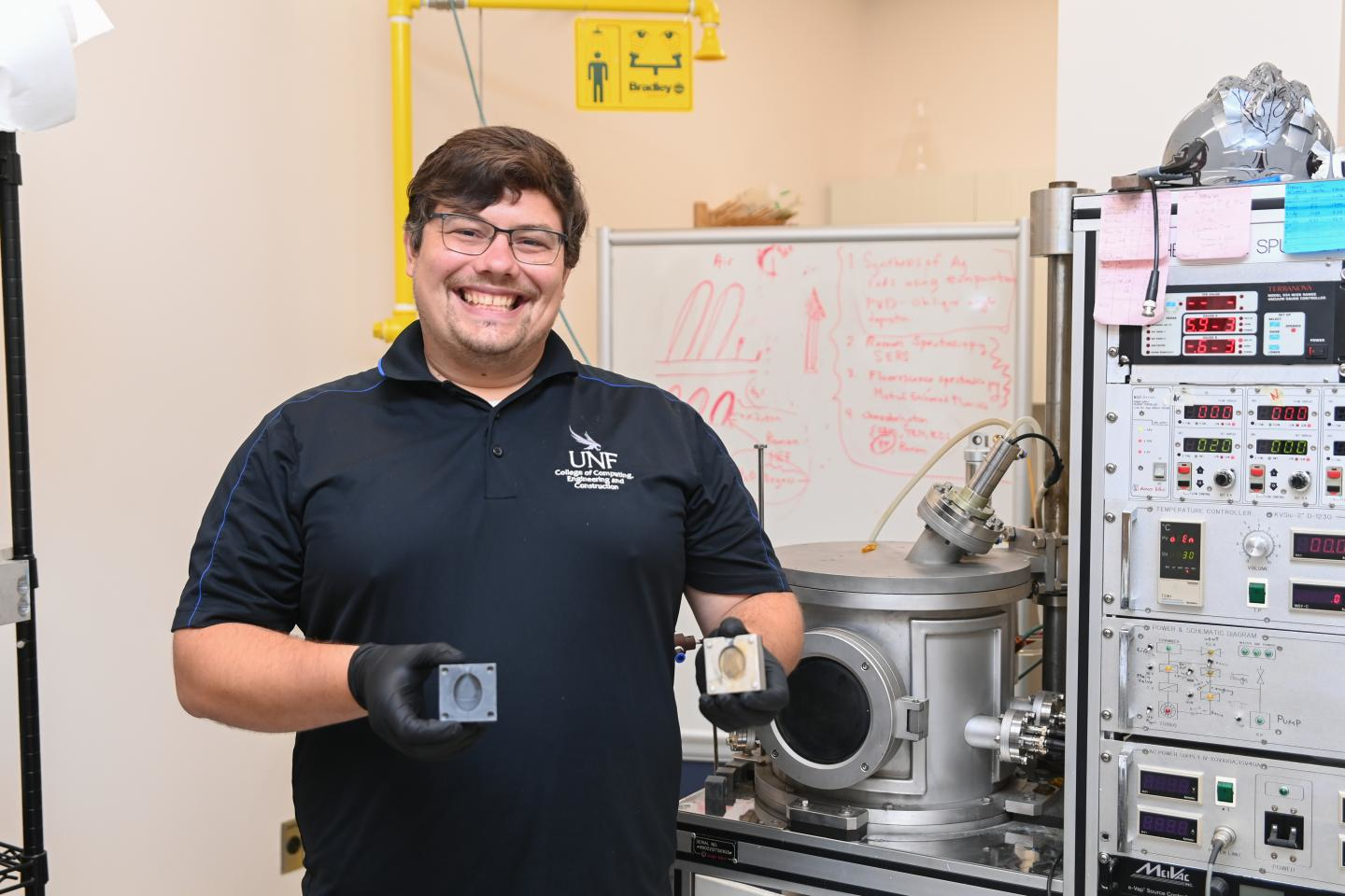 Dr. Steve Stagon holds molds in UNF's 3D Printing Lab.