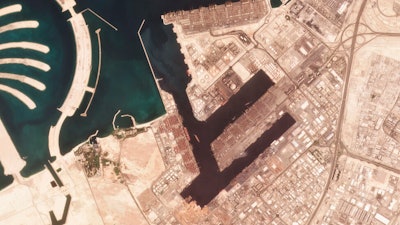 In this satellite photo shot by Planet Labs Inc., the Jebel Ali Port is seen early Wednesday, July 7, 2021, in Dubai, United Arab Emirates. A fiery explosion erupted on a container ship anchored in Dubai at one of the world's largest ports later Wednesday, authorities said, sending tremors across the commercial hub of the United Arab Emirates.