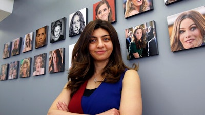 This April 23, 2018 file photo shows Rana el Kaliouby, CEO of the Boston-based artificial intelligence firm, Affectiva, poses in Boston. El Kaliouby has a new job, deputy CEO of Smart Eye — after the Swedish eye-tracking company bought Affectiva for $73.5 million in June 2021. Carmakers are looking to companies like Smart Eye as they brace for new safety rules and standards around the world that could require dashboard cameras to detect dangerous driver behavior in semi-autonomous vehicles.
