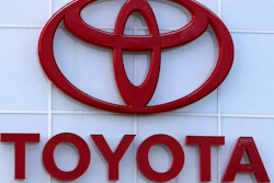 This Aug. 15, 2019, file photo shows the Toyota logo on a dealership in Manchester, N.H. In a deal announced Wednesday, July 21, 2021, Japan’s top automaker Toyota is adding makers specializing in tiny “kei” cars, Daihatsu and Suzuki, to a partnership in commercial vehicles set up with Hino and Isuzu earlier this year.