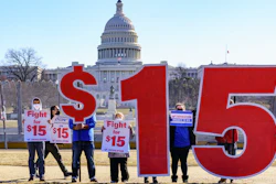 Activists appeal for a $15 minimum wage near the Capitol in Washington, Thursday, Feb. 25, 2021.