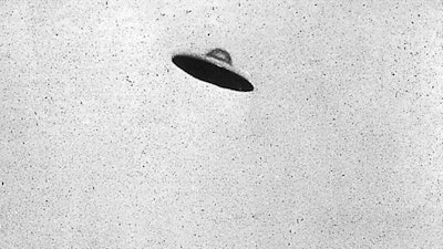In the years following Arnold’s story, UFO sightings and reports – like this purported photo of a UFO from 1952 – exploded in number.
