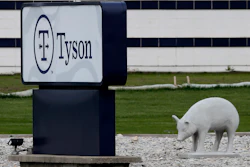 In this May 1, 2020 photo, a sign sits in front of the Tyson Foods plant in Waterloo, IA.