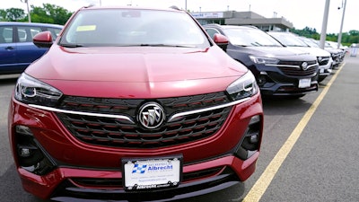 New Buick Encore SUV's displayed on the sales lot at the Albrecht Auto Group dealership on Aug. 3 in Wakefield, Mass.