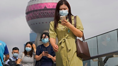 Pedestrian overhead bridge in front of the Oriental Pearl TV Tower, Pudong Financial District, Shanghai, Aug. 25, 2021.