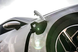 This photo provided by Audi shows the automaker's new all-electric production car, the 2022 e-tron GT, charging up at one of many public charging stations.