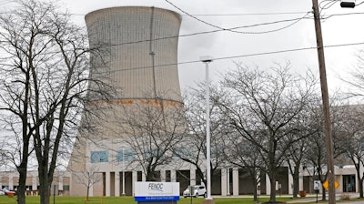 This April 4, 2017, file photo shows the entrance to FirstEnergy Corp.'s Davis-Besse Nuclear Power Station in Oak Harbor, Ohio. A new bipartisan bill in the Ohio Legislature would once again allow power companies to offer energy efficiency programs such as smart thermostats or appliance rebates. The legislation is sponsored by Rep. David Leland, a Columbus Democrat, and Rep. Bill Seitz, a Cincinnati Republican. It's aimed at undoing an element of a now-tainted nuclear power plant bailout bill at the heart of an alleged $60 million bribery scheme.