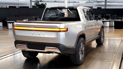 In this Nov. 14, 2018, photo shows Rivian R1T at Rivian headquarters in Plymouth, Mich. Rivian, an Electric vehicle startup backed by Amazon, Ford, and other deep-pocketed investors, confidentially filed to become a publicly traded company this week, Friday, Aug. 27, 2021. Rivian said that the initial public offering is expected to take place after the Securities and Exchange Commission completes its review process.