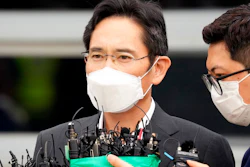 Samsung Electronics Vice Chairman Lee Jae-yong speaks to the media outside of a detention center in Uiwang, South Korea, Friday, Aug. 13, 2021. Embattled Samsung leader Lee apologized for causing public concern upon being paroled from prison Friday with a year left on his sentence for crimes related to the explosive corruption scandal that toppled South Korea’s previous president.