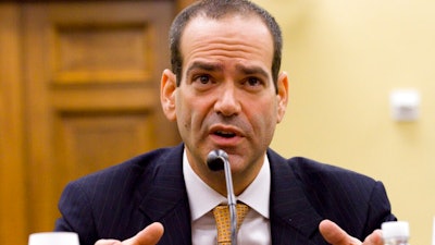 In this April 22, 2010 file photo, Neil Barofsky, Then-Special Inspector General for the Troubled Asset Relief Program testifies before the House Appropriations Subcommittee on Financial Services and General Government on the Financial Crisis and TARP program on Capitol Hill in Washington. The United Auto Workers union’s 397,000 members will vote by mail this fall on whether they want to pick their leaders in direct elections. In a posting on his website, union monitor Neil Barofsky says ballots will be mailed by an election vendor starting Oct. 12.