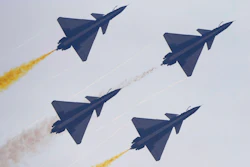 Members of the 'August 1st' Aerobatic Team of the Chinese People's Liberation Army (PLA) Air Force perform during the 13th China International Aviation and Aerospace Exhibition, also known as Airshow China 2021, on Tuesday, Sept. 28, 2021, in Zhuhai in southern China's Guangdong province.