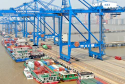 In this aerial photo, container ships are docked at a port on the Yangtze River in Nantong in eastern China's Jiangsu Province, Monday, Sept. 6, 2021. China's import and export growth accelerated in August despite disruptions due to the spread of the coronavirus's delta variant.