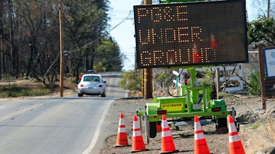 Utilities are burying power lines in California, where above-ground electrical lines and equipment have sparked deadly wildfires in recent years.