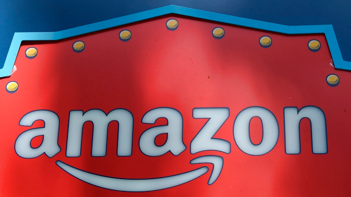 In this Oct. 23, 2018, file photo, an Amazon logo is seen atop the Amazon Treasure Truck The Park DTLA office complex in downtown Los Angeles. U.S. House lawmakers held out the threat of seeking a criminal investigation of Amazon, saying they're giving the tech giant a “final chance' to correct previous testimony by executives on its competition practices. The action, coming in a letter Monday, Oct. 18, 2021 to Amazon President and CEO Andy Jassy, marks an escalation in a bipartisan battle against Amazon by the House Judiciary Committee panel that has investigated the market dominance of Big Tech.