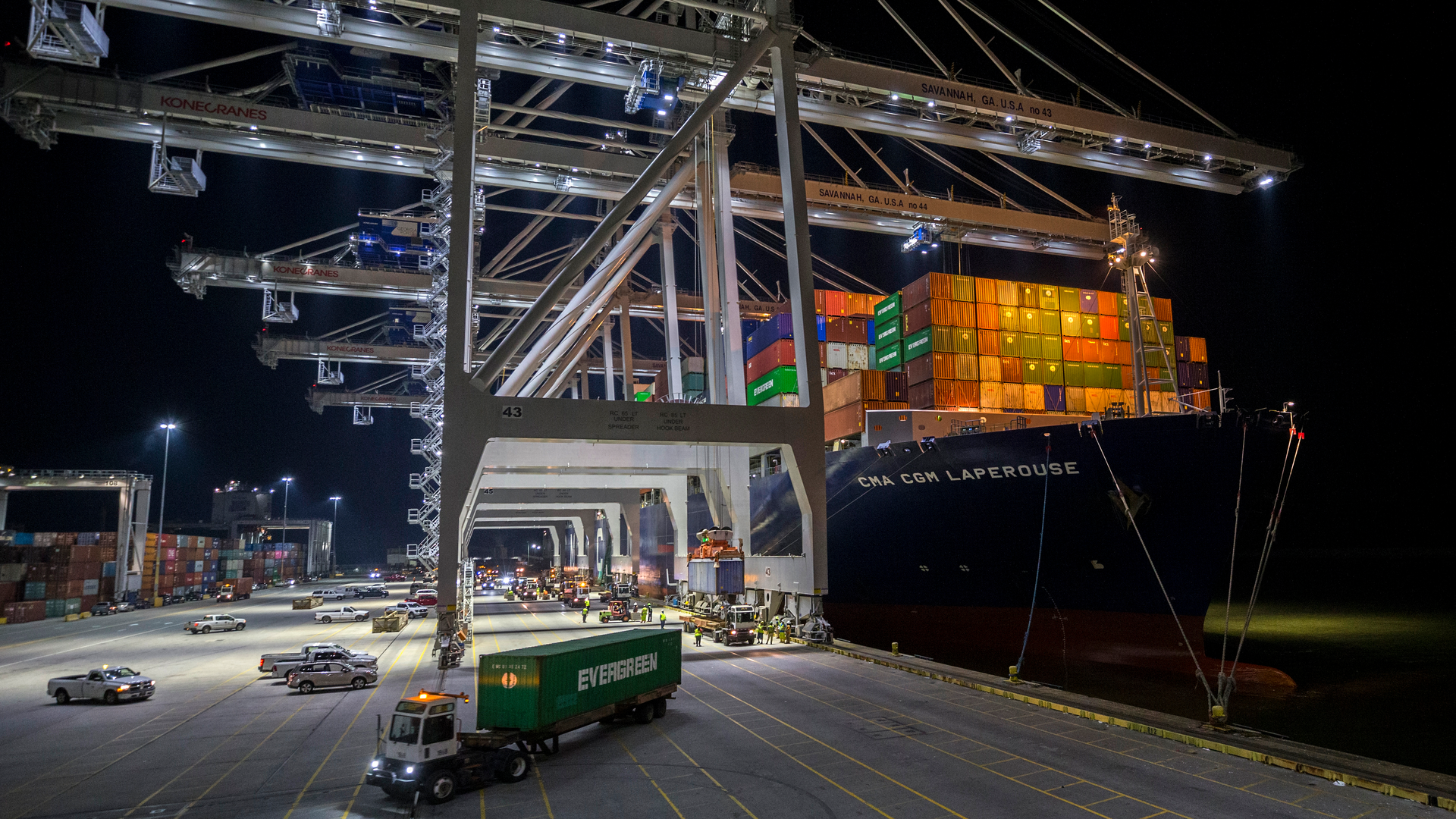 Five ship to shore cranes and gangs of longshoremen work to load and unload the container ship CMA CGM Laperouse at the Georgia Ports Authority's Port of Savannah, Wednesday, Sept. 29, 2021, in Savannah, Ga. With three months until Christmas, toy companies are racing to get their toys onto store shelves as they face a severe supply network crunch.