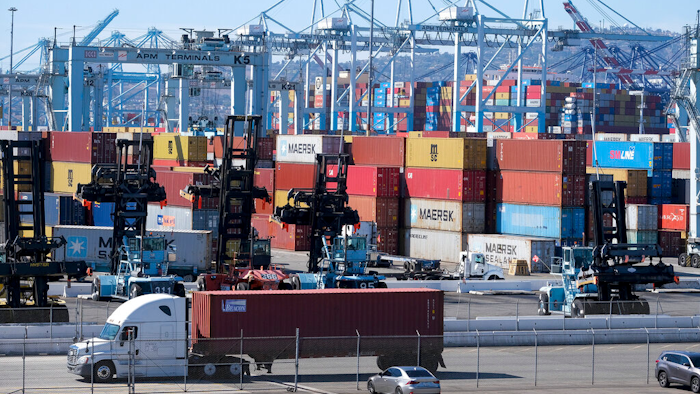 Cargo containers sit stacked at the Port of Los Angeles on Oct. 20, 2021 in San Pedro, CA.