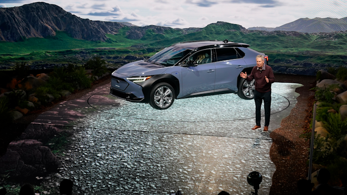 Tom Doll, president and CEO of Subaru of America Inc., introduces the 2023 Subaru Solterra EV at the AutoMobility LA auto show, Nov. 17, 2021, in Los Angeles.