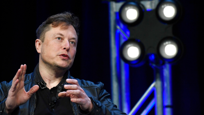 Tesla and SpaceX Chief Executive Officer Elon Musk speaks at the SATELLITE Conference and Exhibition in Washington. SpaceX aims to launch its futuristic, bullet-shaped Starship to orbit in January 2022, followed by about a dozen other test flights next year. Musk provided the update Wednesday night, Nov. 17, 2021, during a space science conference held virtually.
