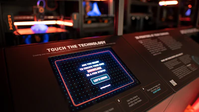 At the expo, the farm is printing snowflakes designed by visitors using touchscreen tablets to select and generate unique designs.