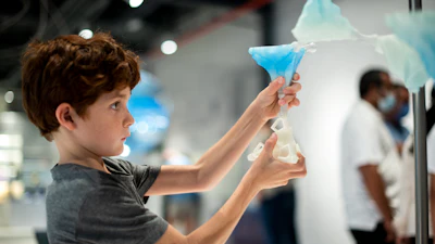 The snowflakes are printed from fluorescent plastic and added to a dynamically growing sculpture.