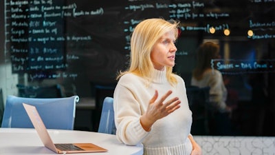 Dr. Frida Polli, co-founder and CEO Pymetrics, talks about AI technology used to assess job skills during an interview with The Associated Press at the Pymetrics headquarters, Thursday, Nov. 18, 2021, in New York.