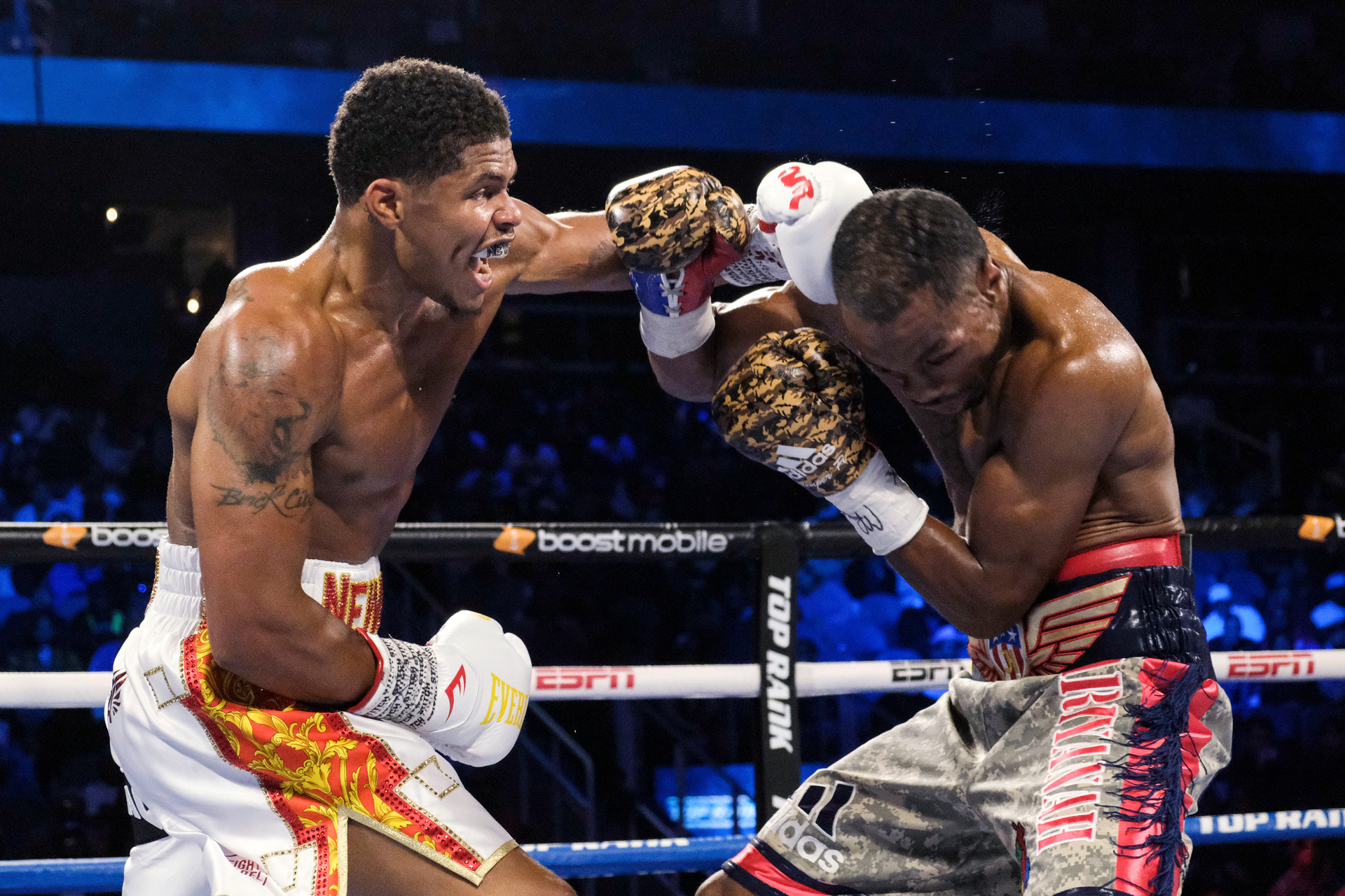 Shakur Stevenson, left, lands a punch on Jamel Herring during a junior lightweight boxing bout in Atlanta, Oct. 24, 2021.