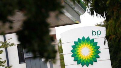 The logo of British Petroleum, BP, adorns a petrol station in west London, Aug. 4, 2020. Soaring oil and gas prices tied to the global economic recovery from the coronavirus pandemic helped bolster British oil giant BP's third-quarter profits, the company said Tuesday Nov. 2, 2021.