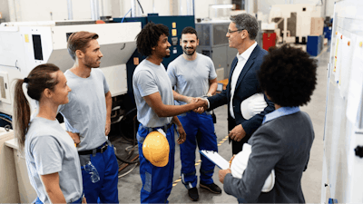 Happy Corporate Manager Shaking Hands With A Worker While Visiting A Factory 1151857619 2125x1417