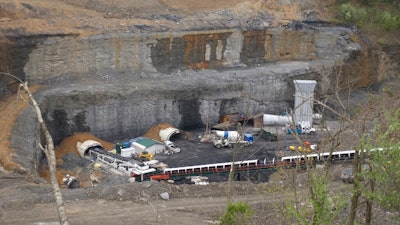 This April 14, 2009, file photo, shows the new Parkway underground mine in Central City, Ky. A group of former coal company officials will go on trial in Kentucky next week for allegedly skirting federal rules meant to reduce deadly dust in underground mines. The four men on trial, who worked for now-bankrupt Armstrong Coal, ordered workers at two Kentucky mines, including the Parkway mine, to rig dust-monitoring equipment to pass air quality tests, federal prosecutors said.