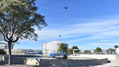 An electronic nose on a drone collects air for odor measurement.