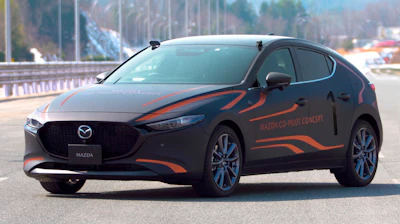 This photo provided by Mazda Motor Corp., shows the Mazda Co-Pilot Concept car in Miyoshi, Hiroshima prefecture, western Japan, on Sept. 30, 2021. Cars already know how to park themselves, warn drowsy drivers, steer back into the right lanes and propose map routes to destinations.