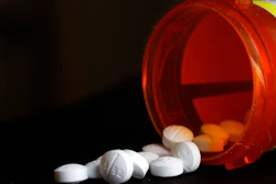 This photo shows an arrangement of Oxycodone pills in New York on Aug. 29, 2018. The Oklahoma Supreme Court has overturned a $465 million opioid ruling against drugmaker Johnson & Johnson, finding that a lower court wrongly interpreted the state's public nuisance law. The court ruled in a 5-1 decision Tuesday, Nov. 9, 2021, that the district court in 2019 was wrong to find that New Jersey-based J&J and its Belgium-based subsidiary Janssen Pharmaceuticals violated the state's public nuisance statute.