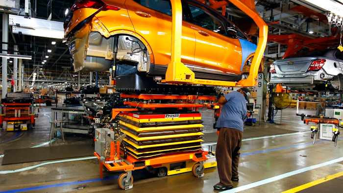 FILE - A battery is lifted into place for installation in the Chevrolet Bolt EV at the General Motors Orion Assembly plant, Nov. 4, 2016, in Orion Township, Mich. Michigan would create new economic development funds to help the state land major business expansions, including possible electric vehicle and battery plants, under fast-tracked bills that received initial approval Wednesday, Dec. 8, 2021.