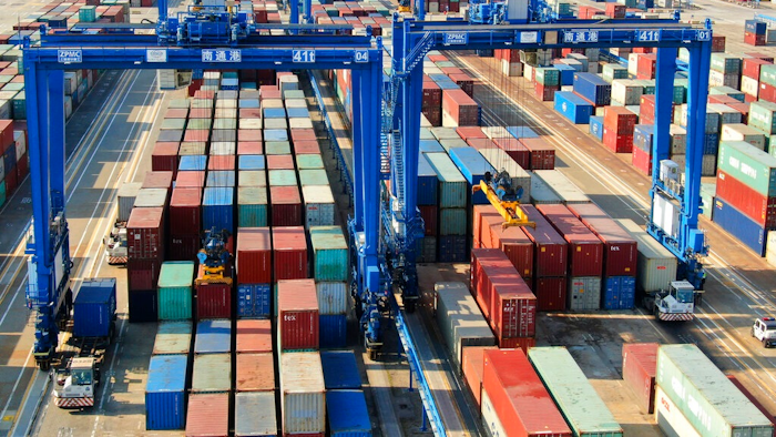 A container port is pictured in Nantong in eastern China's Jiangsu province Monday, Dec. 6, 2021. China's exports rose by double digits in November but growth declined, while imports accelerated in a sign of stronger domestic demand.