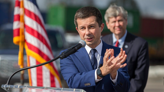 U.S. Transportation Secretary Pete Buttigieg speaks to the media during a visit to the Georgia Ports Authority's Megarail facility, Friday, Dec., 17, 2021 in Savannah, Ga. Buttigieg used the visit to highlight the coordination with the his department and the Georgia Ports Authority to improve its cargo flow.