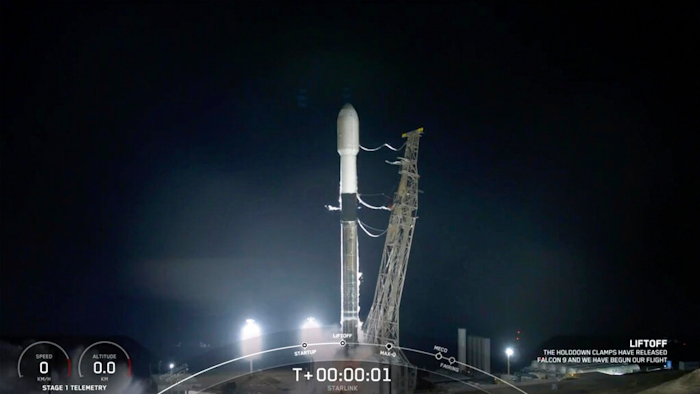 A SpaceX rocket launches from Vandenberg Space Force Base early Saturday, Dec. 18, 2021 at Vandenberg Space Force Base in California. The Falcon’s first stage successfully returned and landed on a SpaceX droneship in the ocean. It was the 11th launch and recovery of the stage, marking a milestone in reusability. The second stage continued into orbit and deployed the satellites.