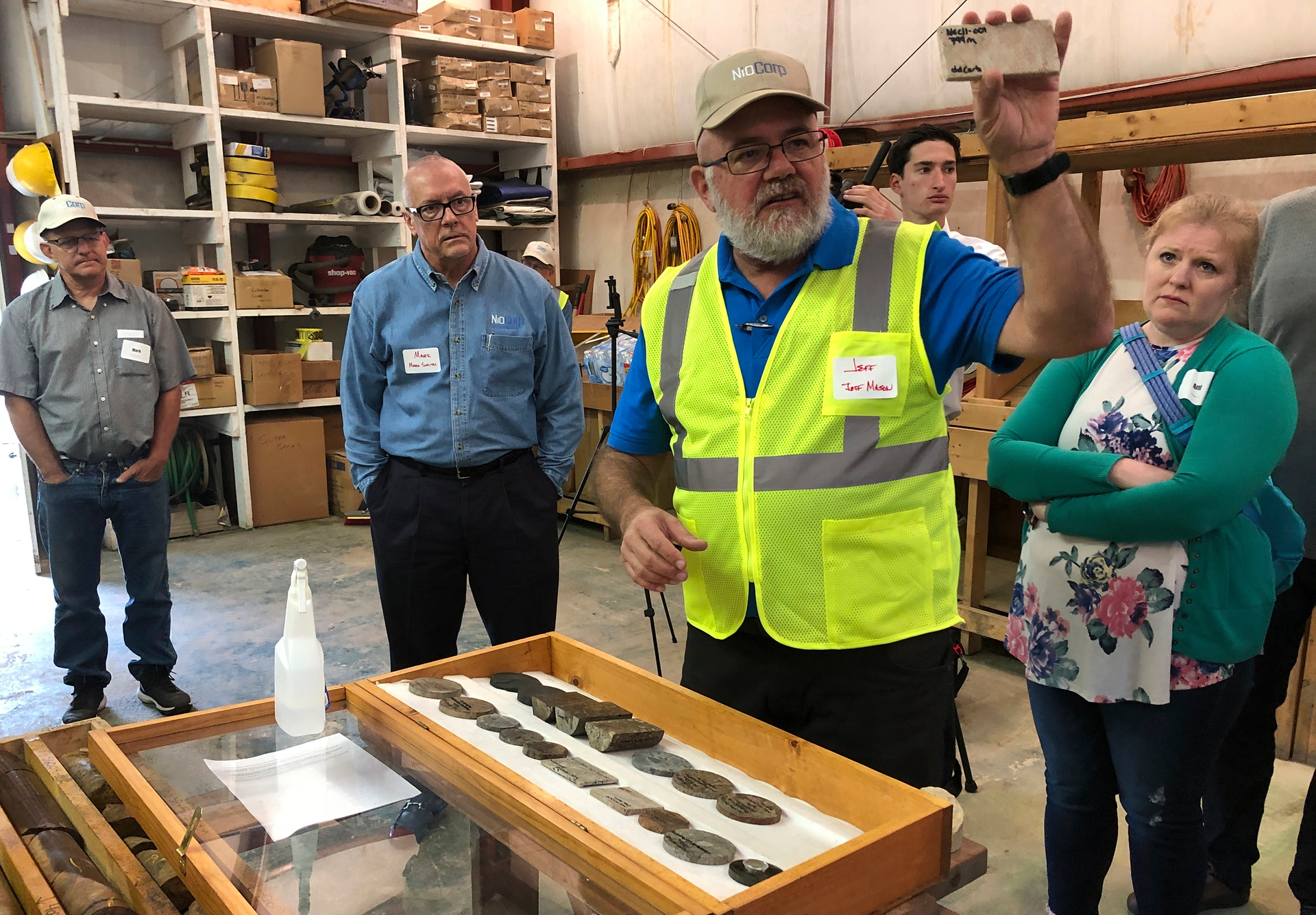 NioCorp Corporate Controller Jeff Mason shows investors a rock sample in Elk Creek, Neb., Oct. 6, 2021.