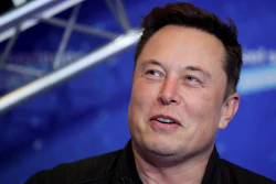 In this Dec. 1, 2020, file photo, SpaceX owner and Tesla CEO Elon Musk arrives on the red carpet for the Axel Springer media award in Berlin.