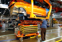 FILE - A battery is lifted into place for installation in the Chevrolet Bolt EV at the General Motors Orion Assembly plant, Nov. 4, 2016, in Orion Township, Mich. Michigan would create new economic development funds to help the state land major business expansions, including possible electric vehicle and battery plants, under fast-tracked bills that received initial approval Wednesday, Dec. 8, 2021.