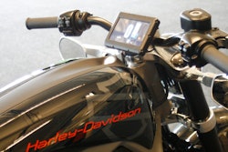 This June 18, 2014 photo shows the control screen on Harley-Davidson's new electric motorcycle, at the company's research facility in Wauwatosa, Wis. Special purpose acquisition company AEA-Bridges Impact Corp. is buying Harley-Davidson's LiveWire unit in a deal that will makes the division the first publicly traded electric motorcycle company in the U.S.