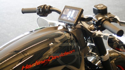 This June 18, 2014 photo shows the control screen on Harley-Davidson's new electric motorcycle, at the company's research facility in Wauwatosa, Wis. Special purpose acquisition company AEA-Bridges Impact Corp. is buying Harley-Davidson's LiveWire unit in a deal that will makes the division the first publicly traded electric motorcycle company in the U.S.