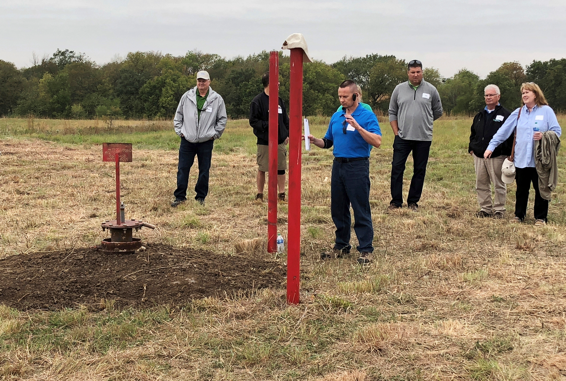 NioCorp Chief Operating Officer Scott Honan tells a group of investors during a tour of the site on Oct. 6, 2021, about the plans for a proposed mine near Elk Creek in southeast Nebraska. The company hopes to build the mine to extract several critical minerals, if it can raise $1 billion.