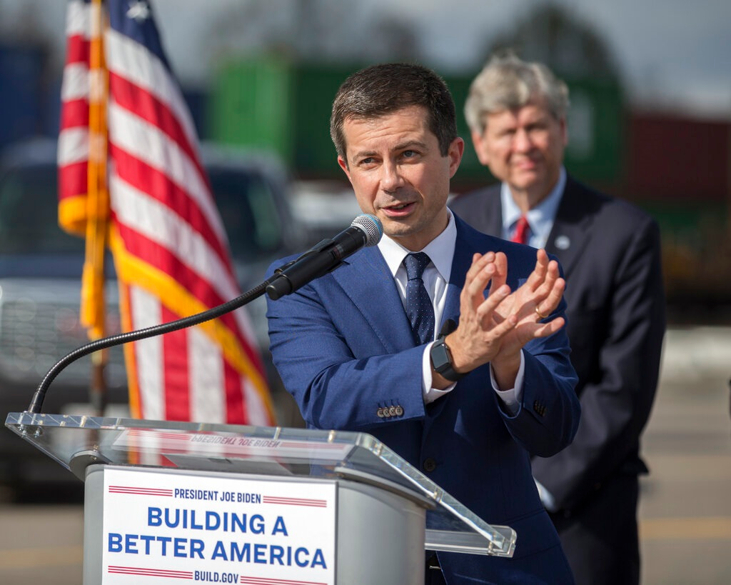 U.S. Transportation Secretary Pete Buttigieg speaks to the media during a visit to the Georgia Ports Authority's Megarail facility, Friday, Dec., 17, 2021 in Savannah, Ga. Buttigieg used the visit to highlight the coordination with the his department and the Georgia Ports Authority to improve its cargo flow.