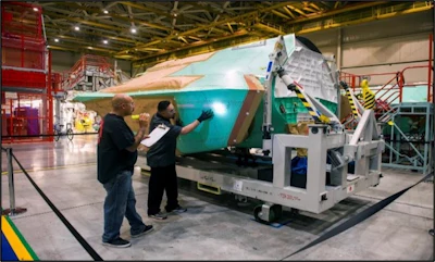 The manual inspection process of the F-35 introduces variables and also puts workers at risk as they attempt to straddle the smooth contoured surfaces of the aircraft.