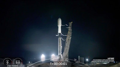 A SpaceX rocket launches from Vandenberg Space Force Base early Saturday, Dec. 18, 2021 at Vandenberg Space Force Base in California. The Falcon’s first stage successfully returned and landed on a SpaceX droneship in the ocean. It was the 11th launch and recovery of the stage, marking a milestone in reusability. The second stage continued into orbit and deployed the satellites.