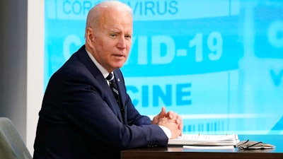 President Joe Biden speaks about the government's COVID-19 response, in the South Court Auditorium in the Eisenhower Executive Office Building on the White House Campus in Washington on Jan. 13, 2022.