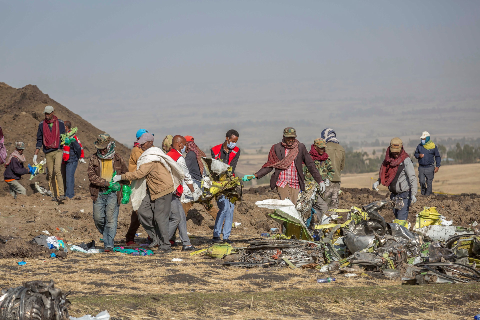 Rescuers work at the scene of an Ethiopian Airlines crash near Bishoftu, Ethiopia, March 11, 2019.