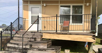 This Make It Right home’s front porch was crumbling and collapsing in 2021.